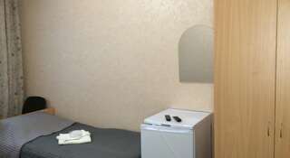 Гостевой дом Mini-Hotel Sibir Тарко-Сале Кровать в общем номере с 2 кроватями-1